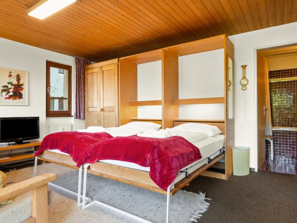 Postel nebo postele na pokoji v ubytování Apartment Aragon N103 by Interhome