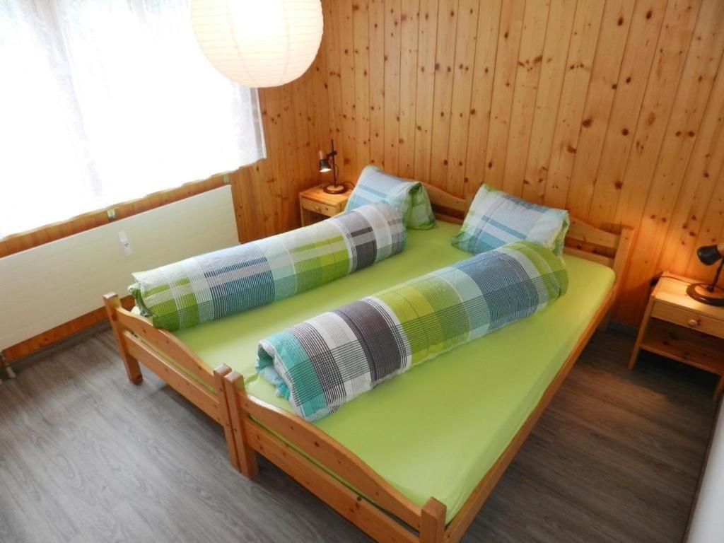 Postel nebo postele na pokoji v ubytování Apartment Résidence Sonnegg - Vuilleumier by Interhome