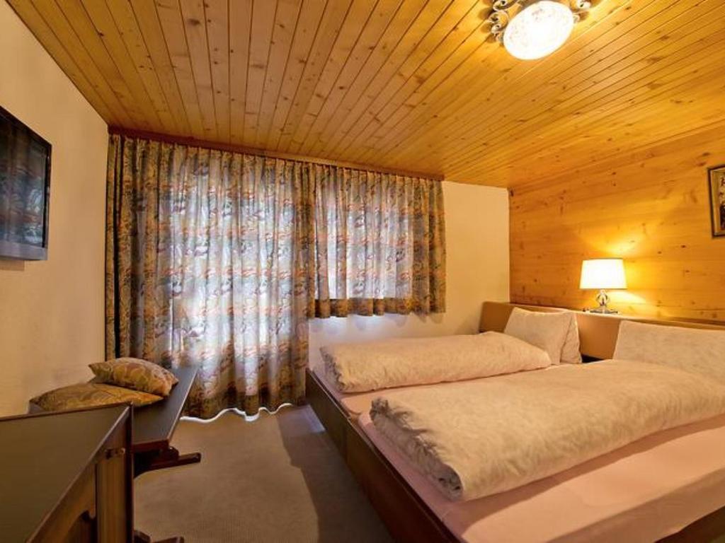 Postel nebo postele na pokoji v ubytování Apartment Maria by Interhome
