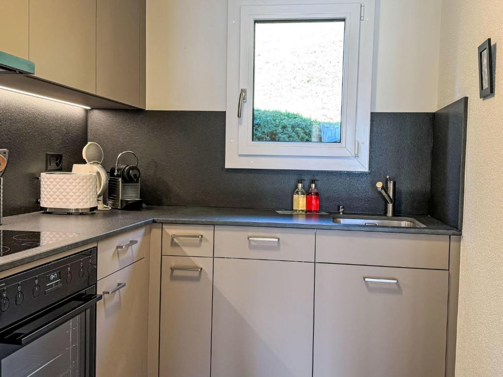 Kuchyň nebo kuchyňský kout v ubytování Apartment Bergkristall Apt- P by Interhome