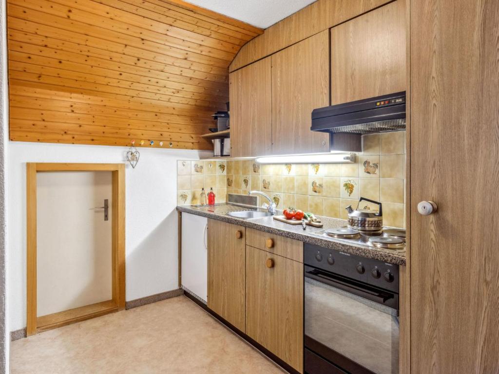 Kuchyň nebo kuchyňský kout v ubytování Apartment Eiger Residence Apt-A-425 by Interhome