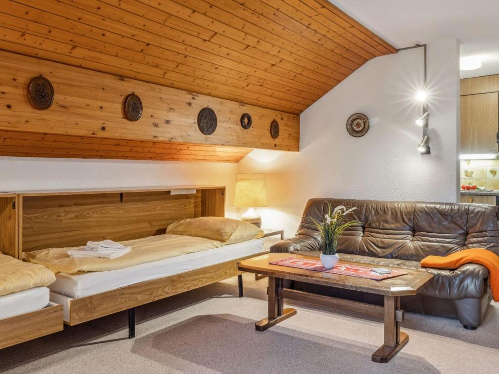 Postel nebo postele na pokoji v ubytování Apartment Eiger Residence Apt-A-425 by Interhome