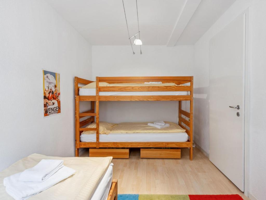 Postel nebo postele na pokoji v ubytování Apartment Bristol Apt-S by Interhome