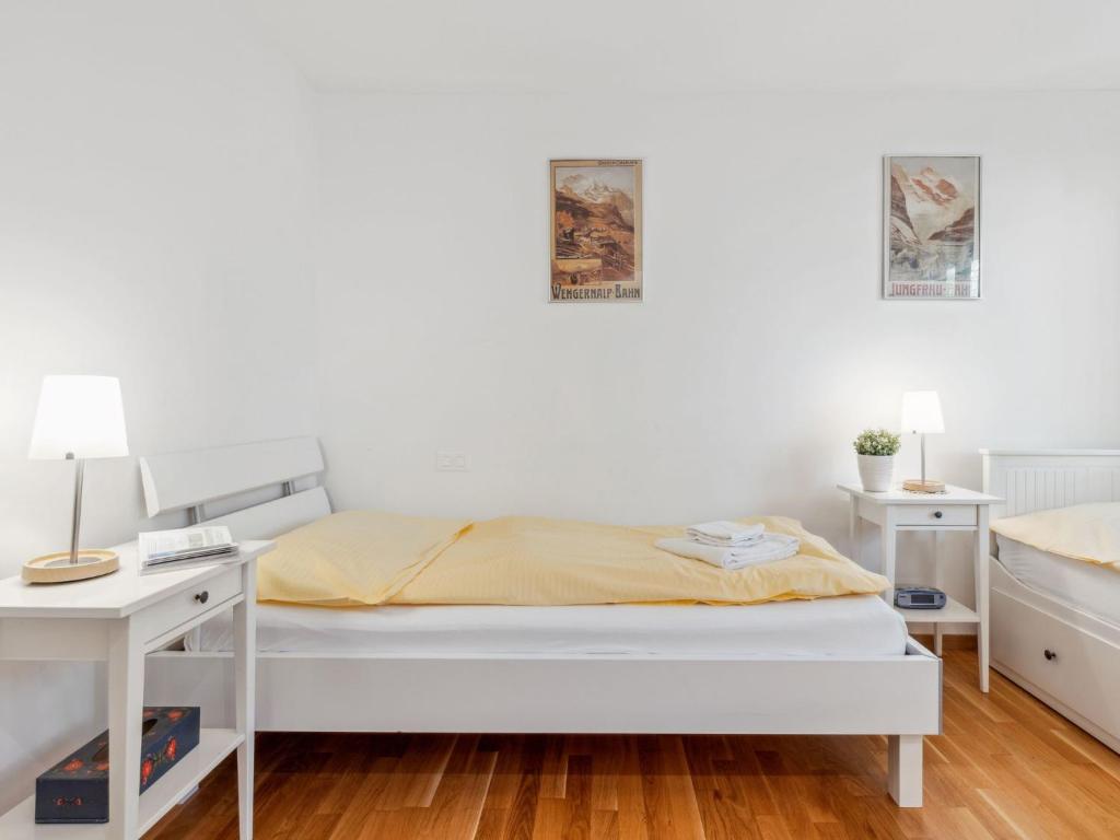 Postel nebo postele na pokoji v ubytování Apartment Am Acher II Apt- F by Interhome