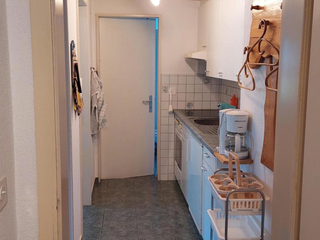Kuchyň nebo kuchyňský kout v ubytování Apartment Daheim by Interhome