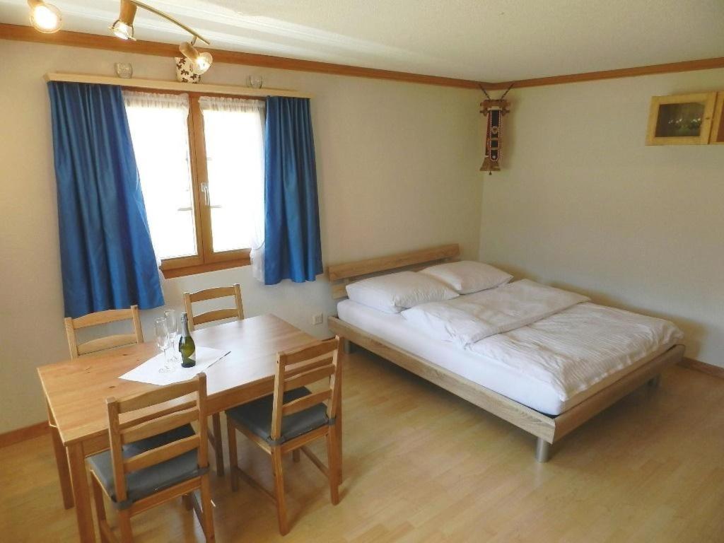 Postel nebo postele na pokoji v ubytování Apartment Studio Rinderbergblick by Interhome
