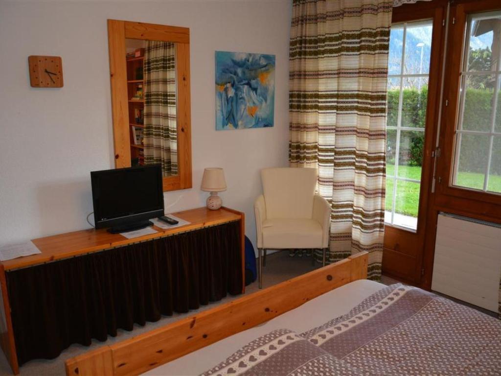 Postel nebo postele na pokoji v ubytování Apartment Simmental by Interhome