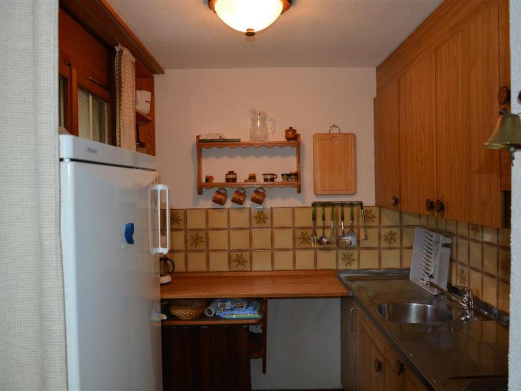 Kuchyň nebo kuchyňský kout v ubytování Apartment Simmental by Interhome