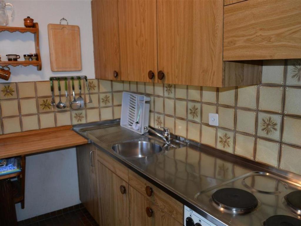 Kuchyň nebo kuchyňský kout v ubytování Apartment Simmental by Interhome