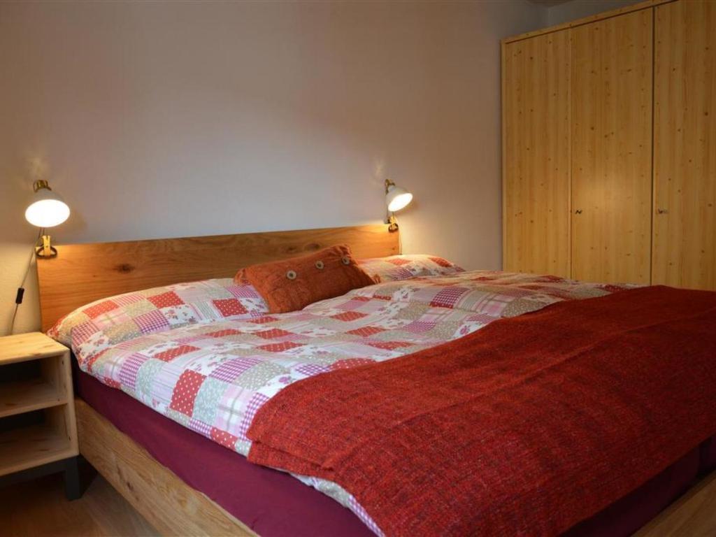 Postel nebo postele na pokoji v ubytování Apartment Oehrli by Interhome