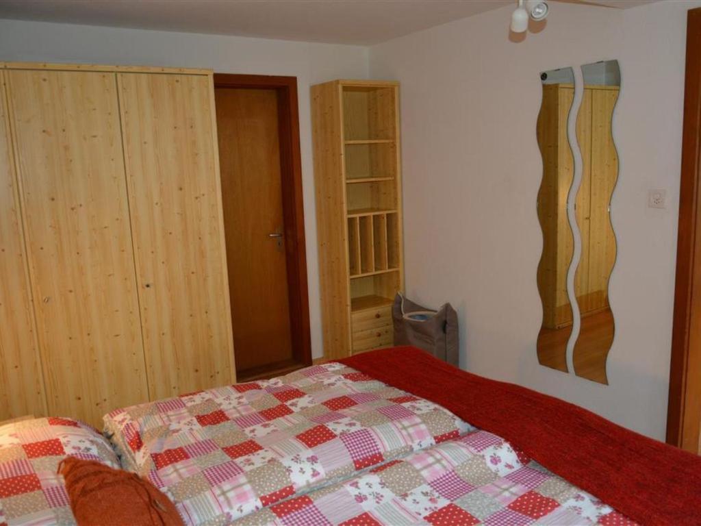 Postel nebo postele na pokoji v ubytování Apartment Oehrli by Interhome