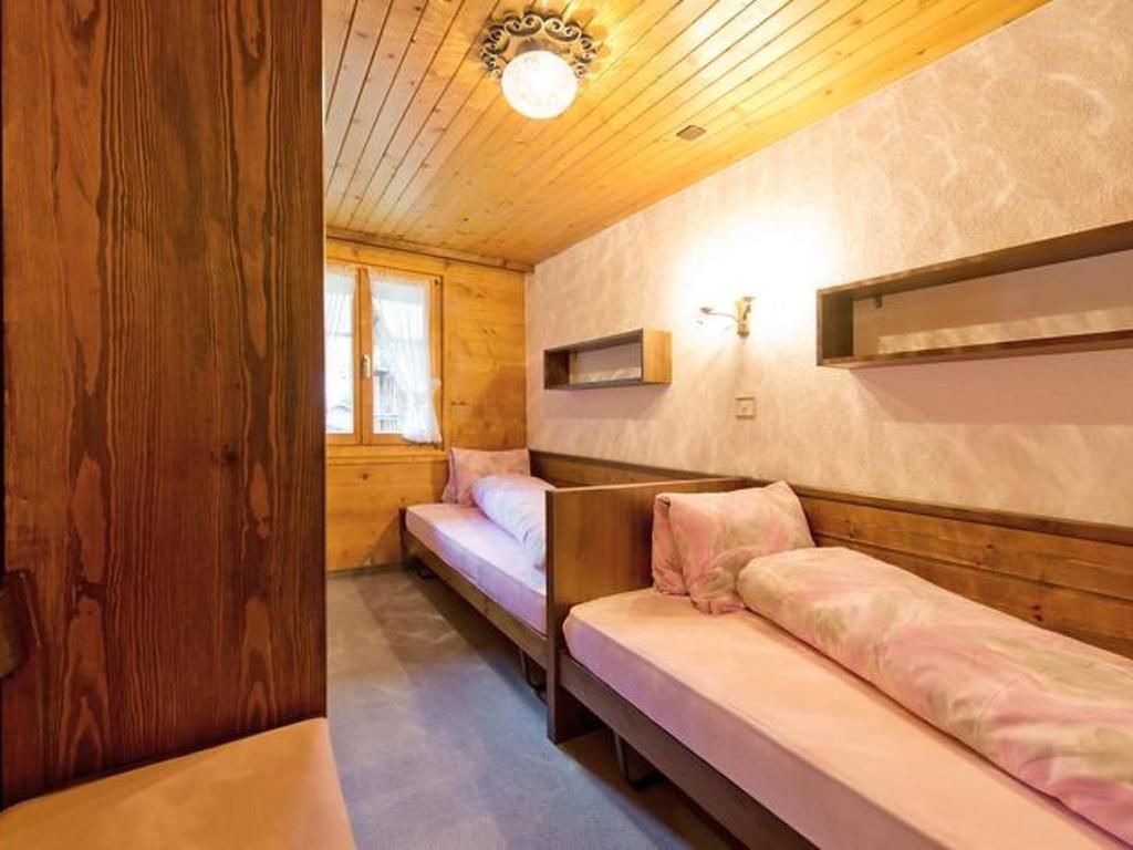 Postel nebo postele na pokoji v ubytování Apartment Maria by Interhome