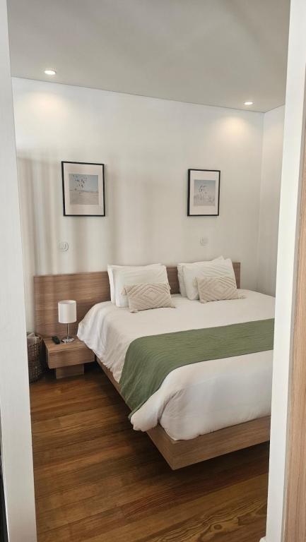 Postel nebo postele na pokoji v ubytování Polery Apartments Center