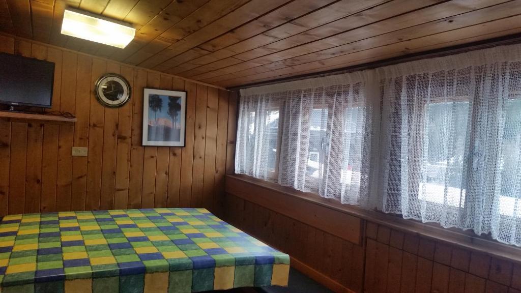 Posteľ alebo postele v izbe v ubytovaní Chalet Belvedere