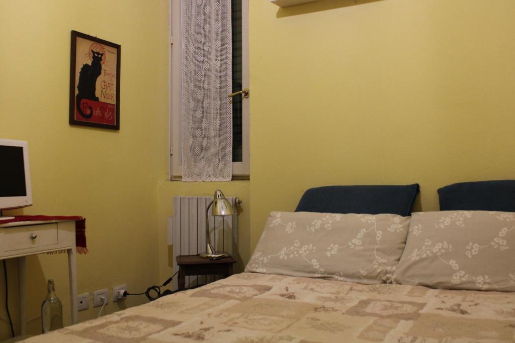 Postel nebo postele na pokoji v ubytování Bovisa il Design avanza