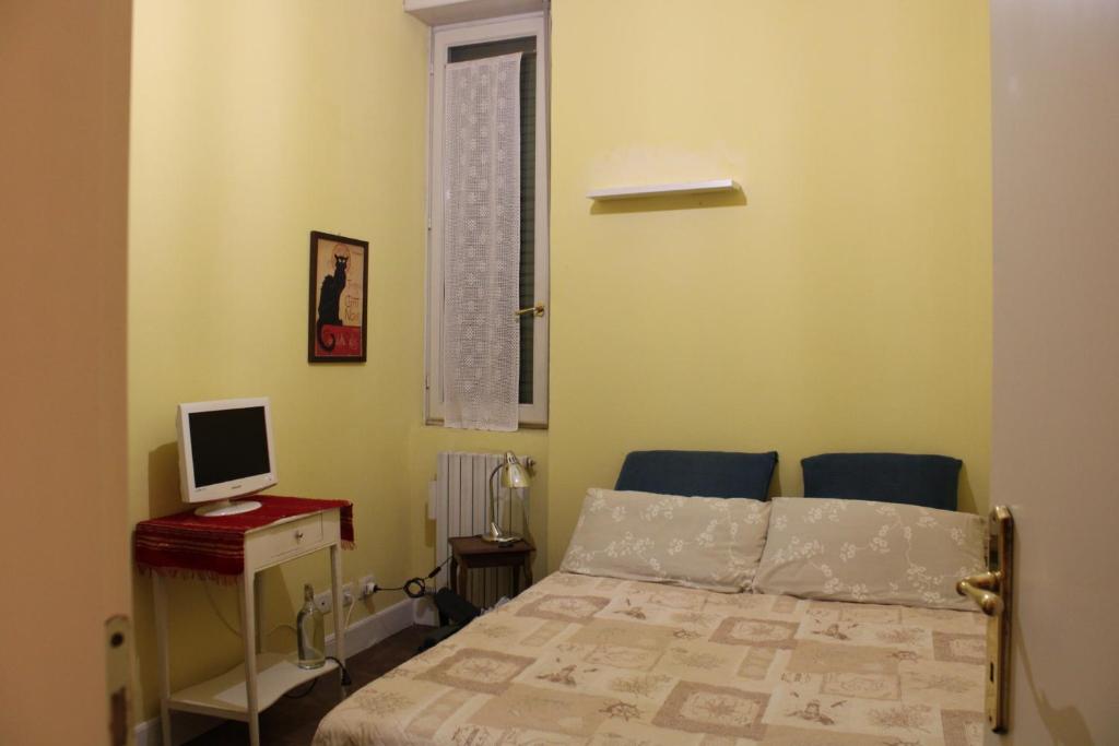 Postel nebo postele na pokoji v ubytování Bovisa il Design avanza