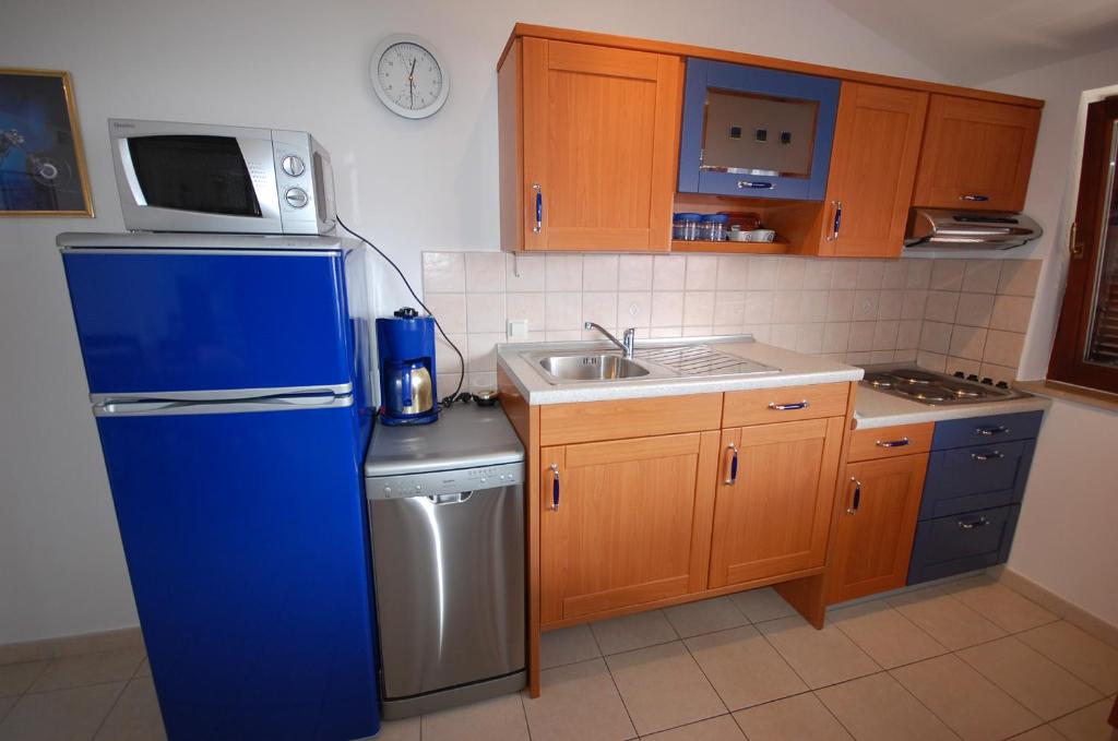 Kuchnia lub aneks kuchenny w obiekcie Apartment Grozic