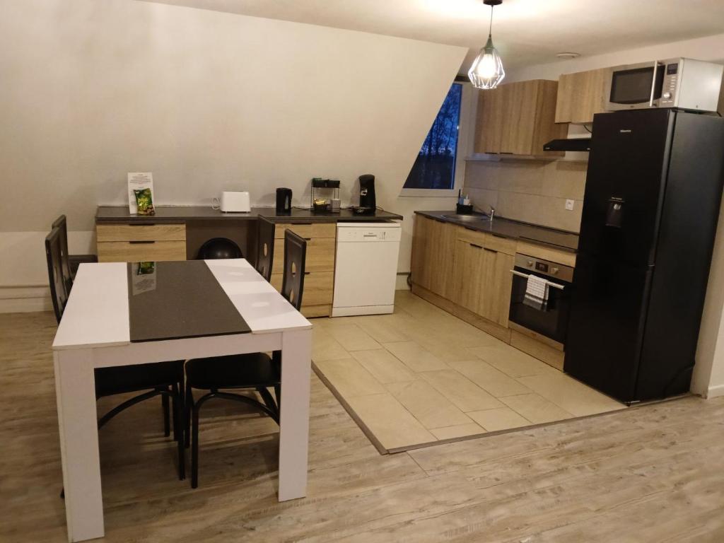 Kuchyň nebo kuchyňský kout v ubytování Gîte du logelbach