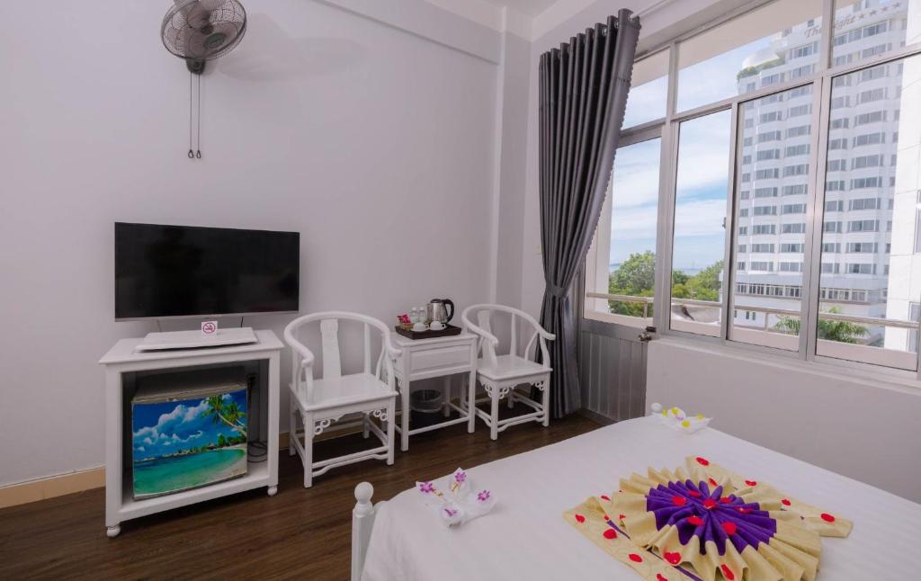 TV a/nebo společenská místnost v ubytování CCT Luxury Hotel