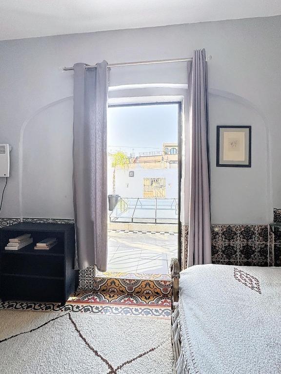 Postel nebo postele na pokoji v ubytování Riad ider
