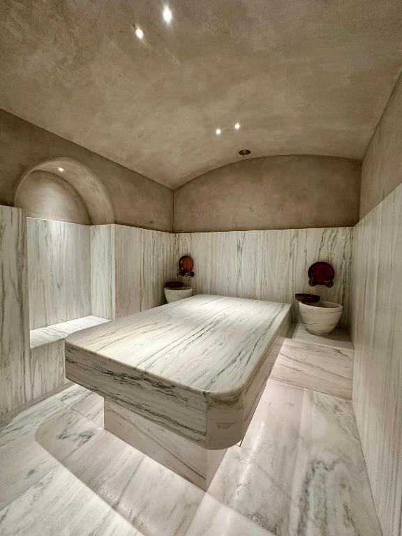 Postel nebo postele na pokoji v ubytování Niche Hotel Athens