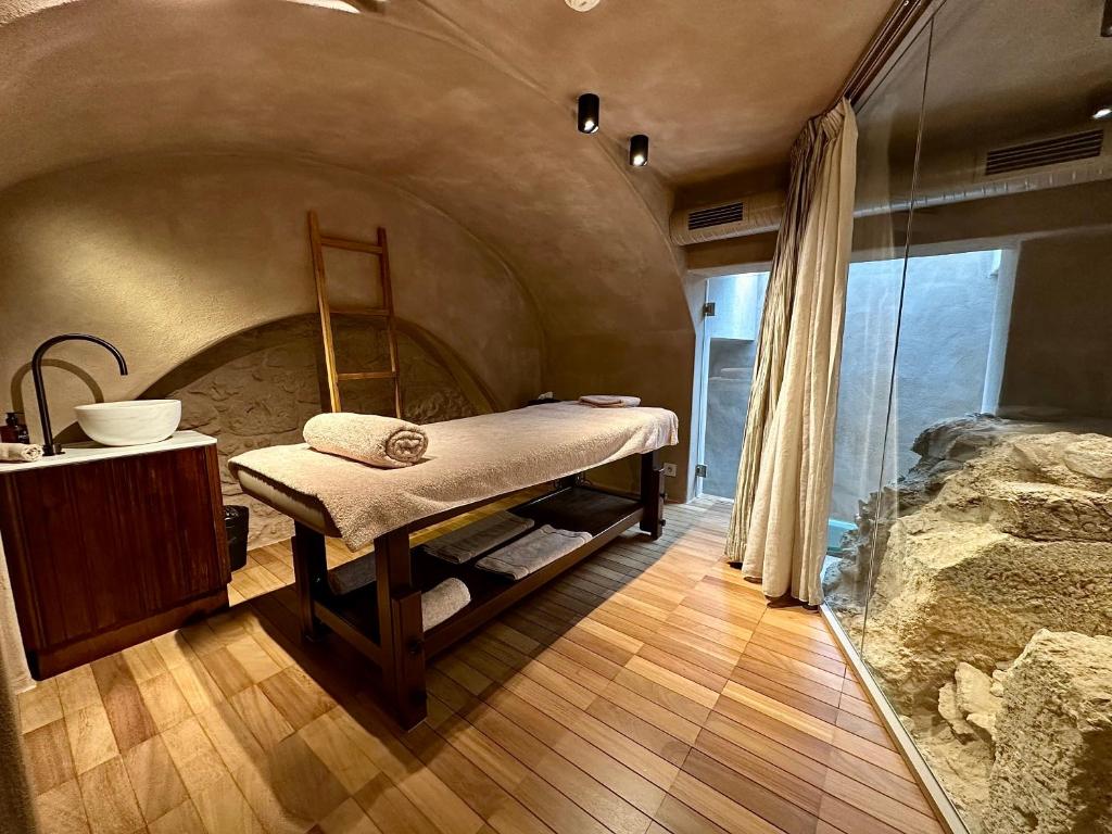 Postel nebo postele na pokoji v ubytování Niche Hotel Athens