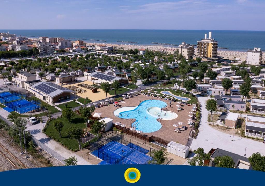 an aerial view of a resort with a swimming pool at Club del Sole Rimini Family Resort in Rimini