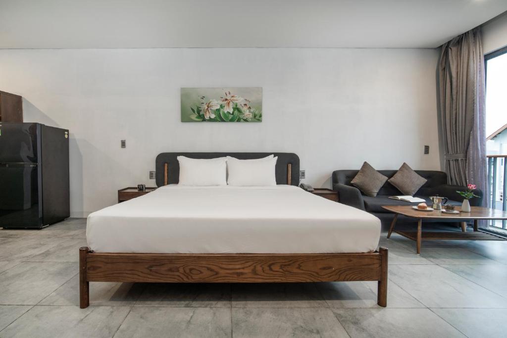 Postel nebo postele na pokoji v ubytování DOMA by HSuites Hotel & Apartment