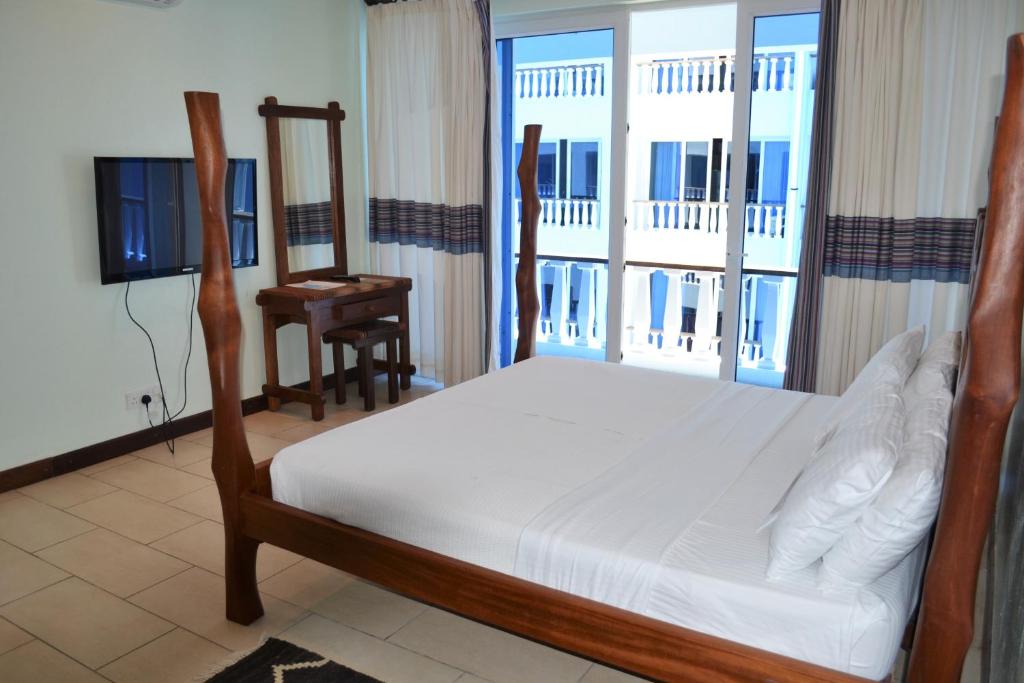 Cowrie Shell Beach Apartments Official - One-Bedroom Apartment