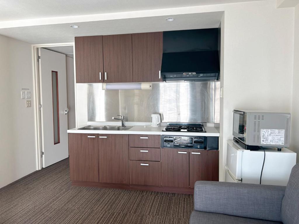 Kuchyň nebo kuchyňský kout v ubytování 山中ビル3Fーワンフロア貸切48平方メートルone floor private room