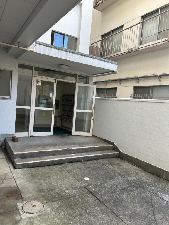 Fotografie z fotogalerie ubytování 蕨北野マンションWarabi Mansionー無料駐車場付き v destinaci Warabi