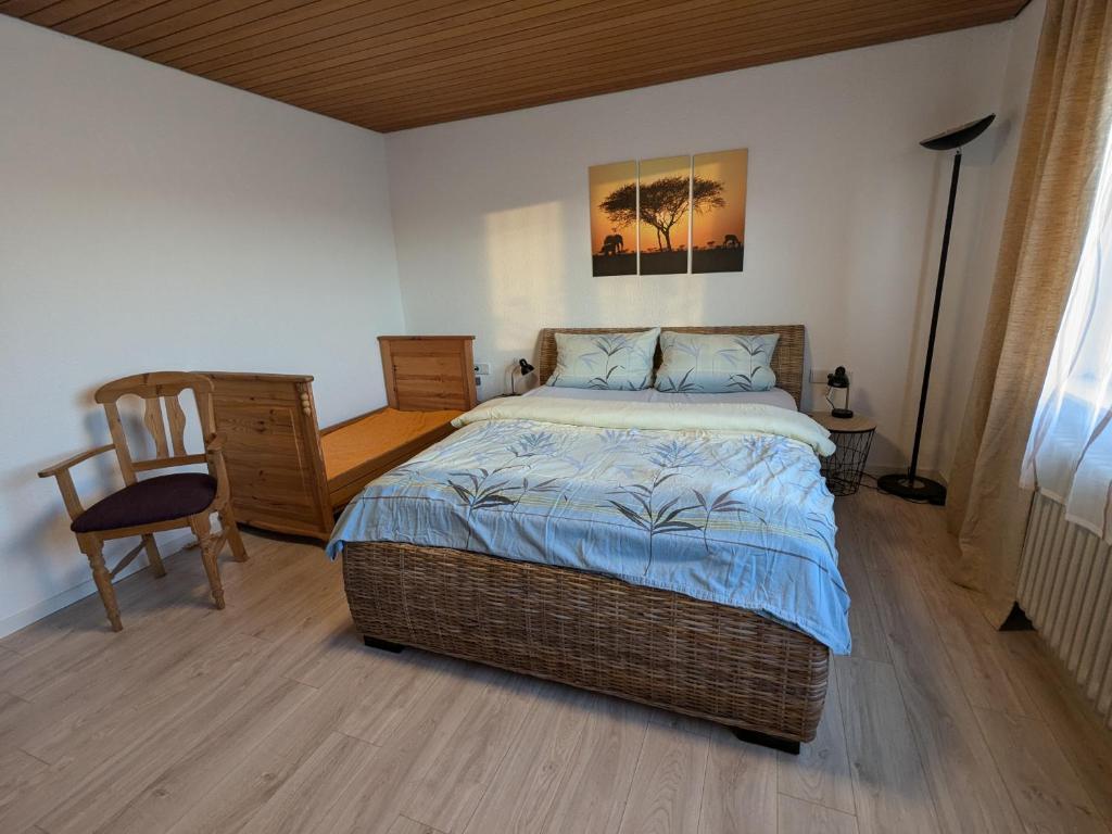 Postel nebo postele na pokoji v ubytování Ferienwohnung Fornsbachblick