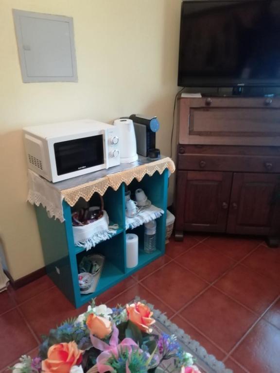 TV a/nebo společenská místnost v ubytování Alojamento Local Casa Veras