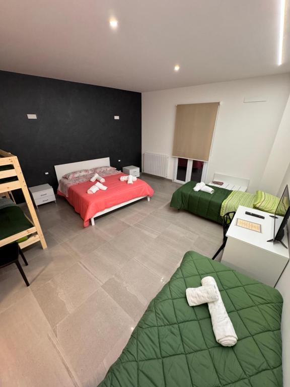 Le Camere dell'Emiro 2 - Sala Familiar Con Baño Privado