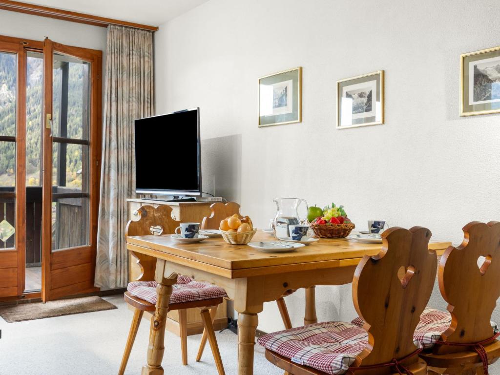 TV a/nebo společenská místnost v ubytování Apartment Aragon M88 by Interhome
