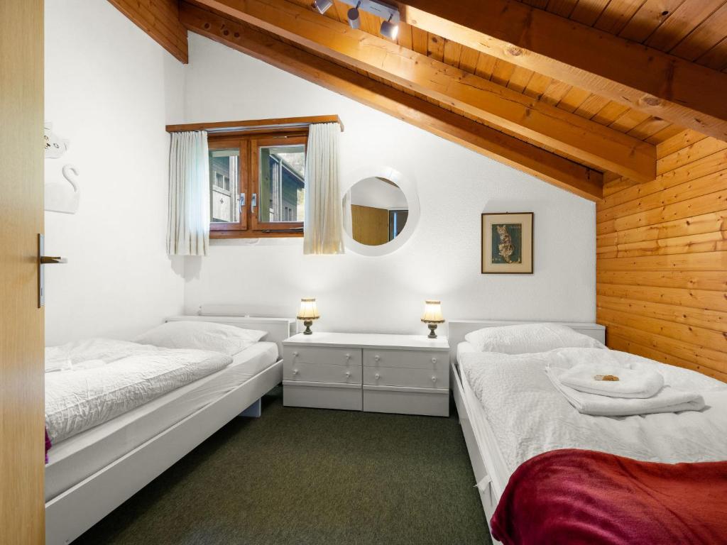 Postel nebo postele na pokoji v ubytování Apartment Aragon M88 by Interhome