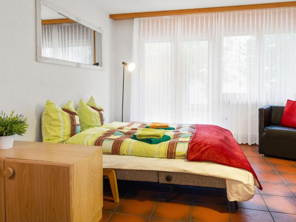 Postel nebo postele na pokoji v ubytování Apartment Alicia by Interhome