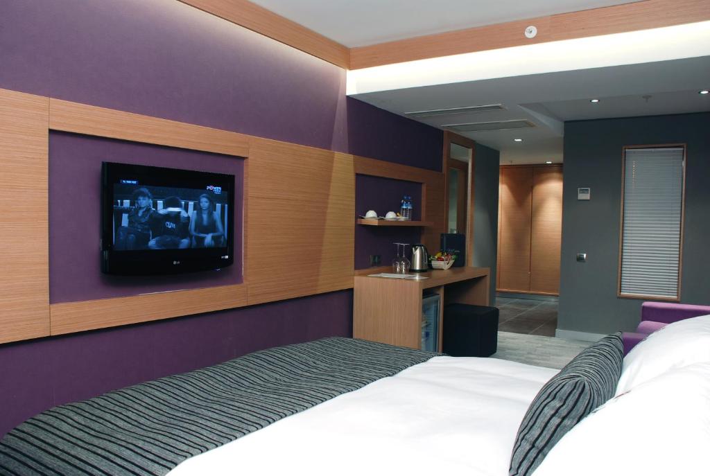 TV a/nebo společenská místnost v ubytování Met Hotel