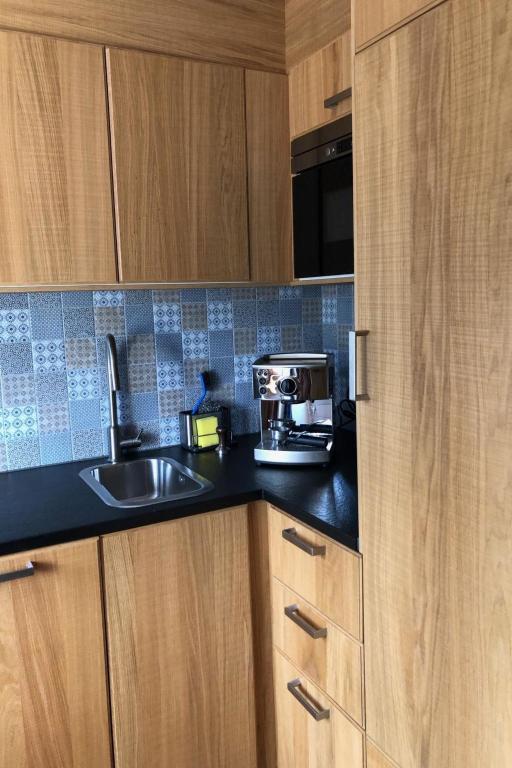 Kuchyň nebo kuchyňský kout v ubytování Apartment Strubeli by Interhome