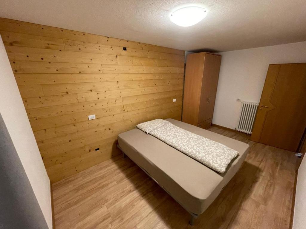 Postel nebo postele na pokoji v ubytování Appartamento Cima Cavalli
