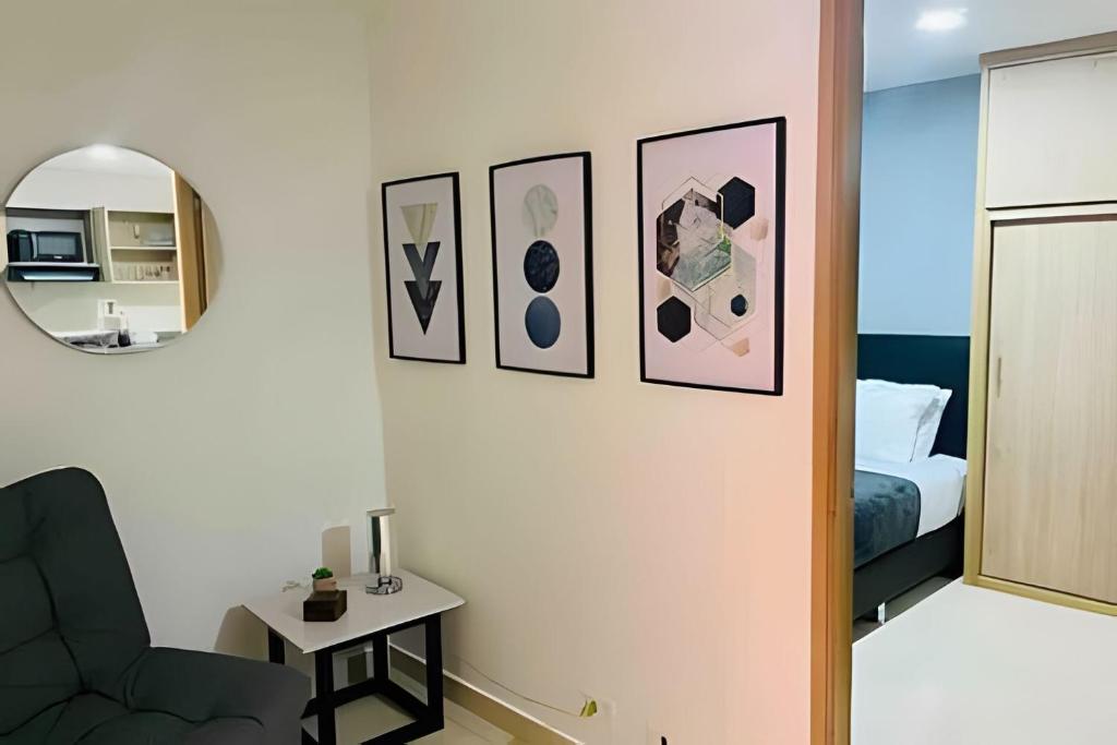 Postel nebo postele na pokoji v ubytování 9902Aparta estudio totalmente dotado WiFi200 megas