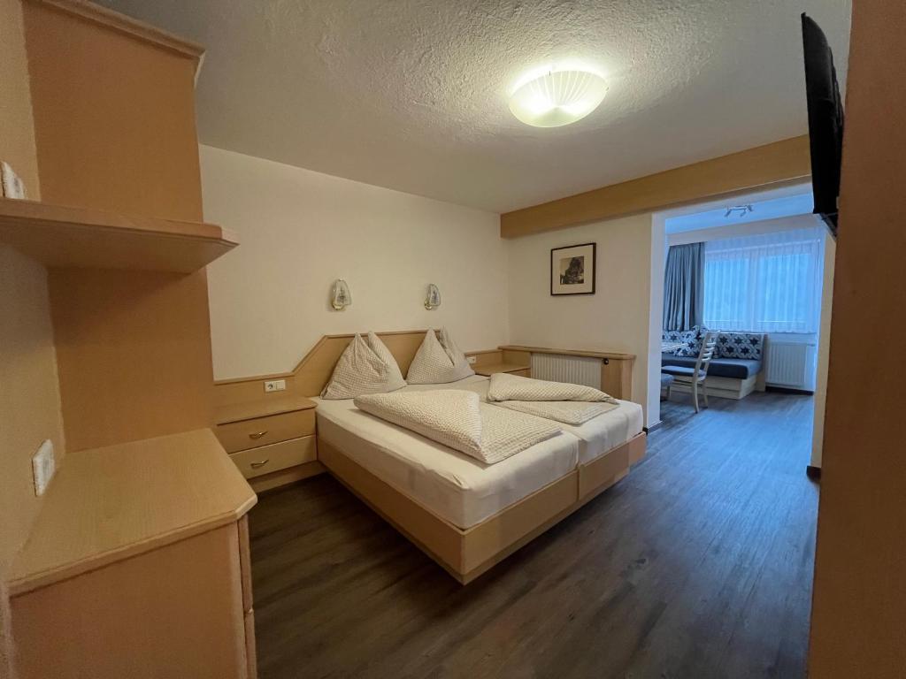 Posteľ alebo postele v izbe v ubytovaní Franzele Appartements & Breakfast