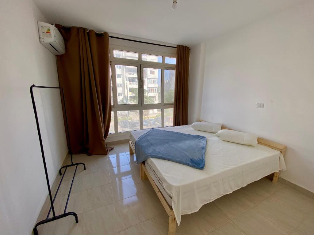 Ένα ή περισσότερα κρεβάτια σε δωμάτιο στο Elegant Home with Free WiFi in Madinaty