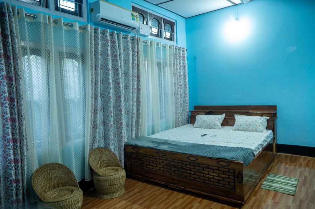 Postel nebo postele na pokoji v ubytování Kangcho Homestay