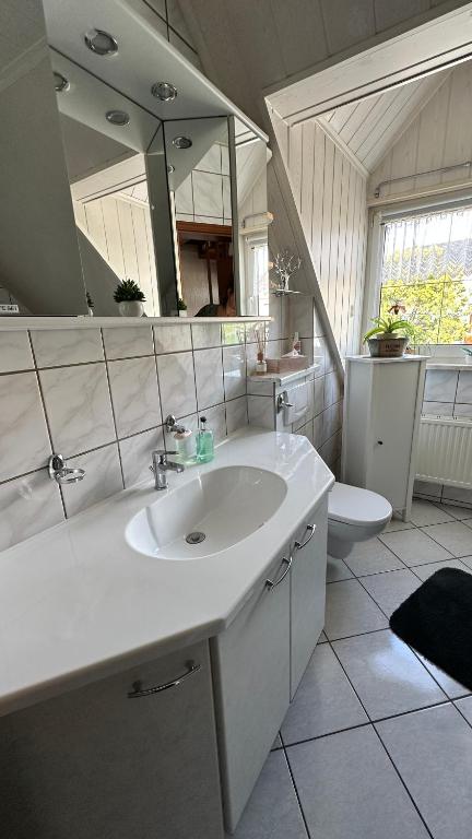 Koupelna v ubytování Gästezimmer zum Waldsachsener Grund