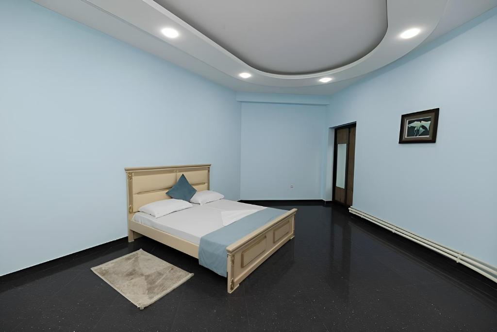 Postel nebo postele na pokoji v ubytování Continental Hotel Complex