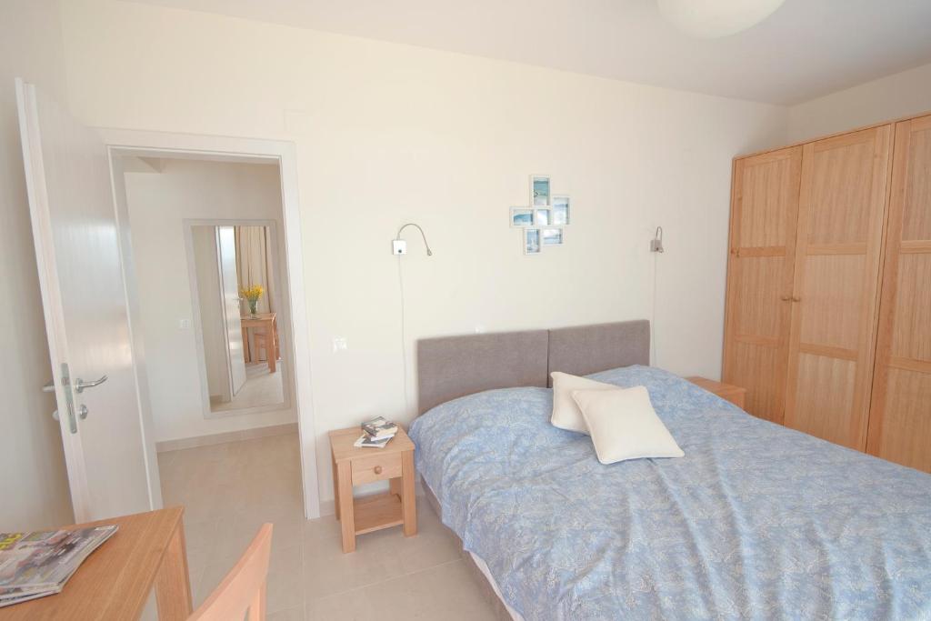 Posteľ alebo postele v izbe v ubytovaní Eol Apartments Viganj