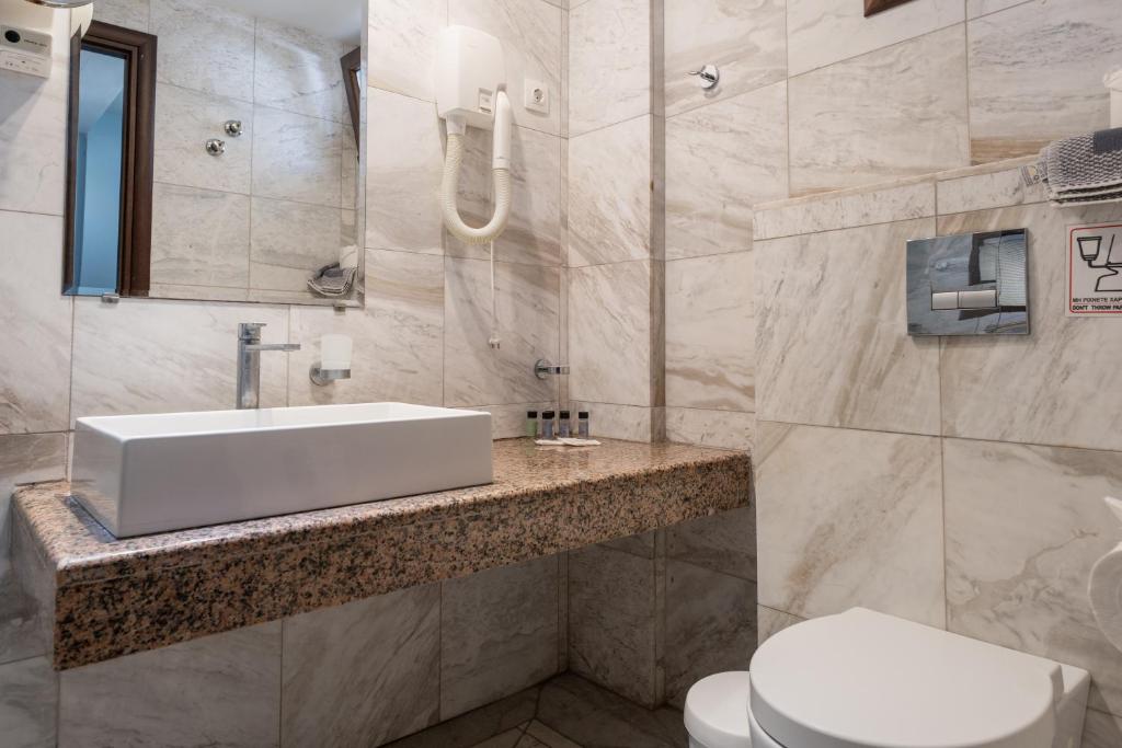 Koupelna v ubytování Hotel Makednos