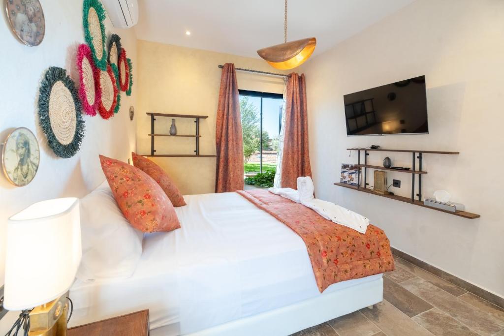 Postel nebo postele na pokoji v ubytování Stylish hôtel