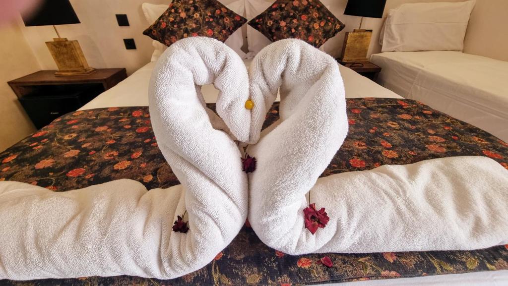 Postel nebo postele na pokoji v ubytování Stylish hôtel